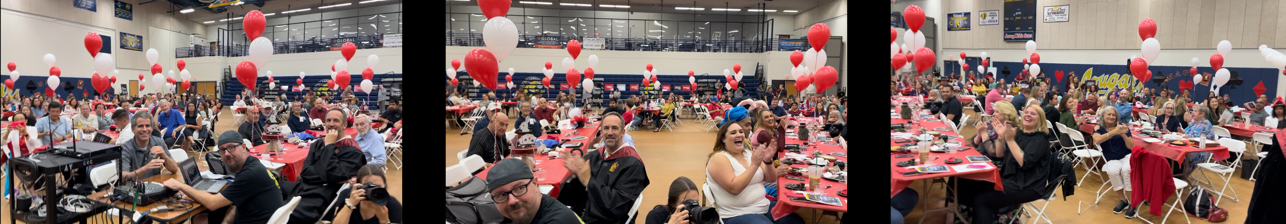 A packed corporate audience laughing during Chris Canfield’s show, balloons above the tables